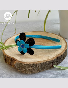 Serre tête fleur bleue